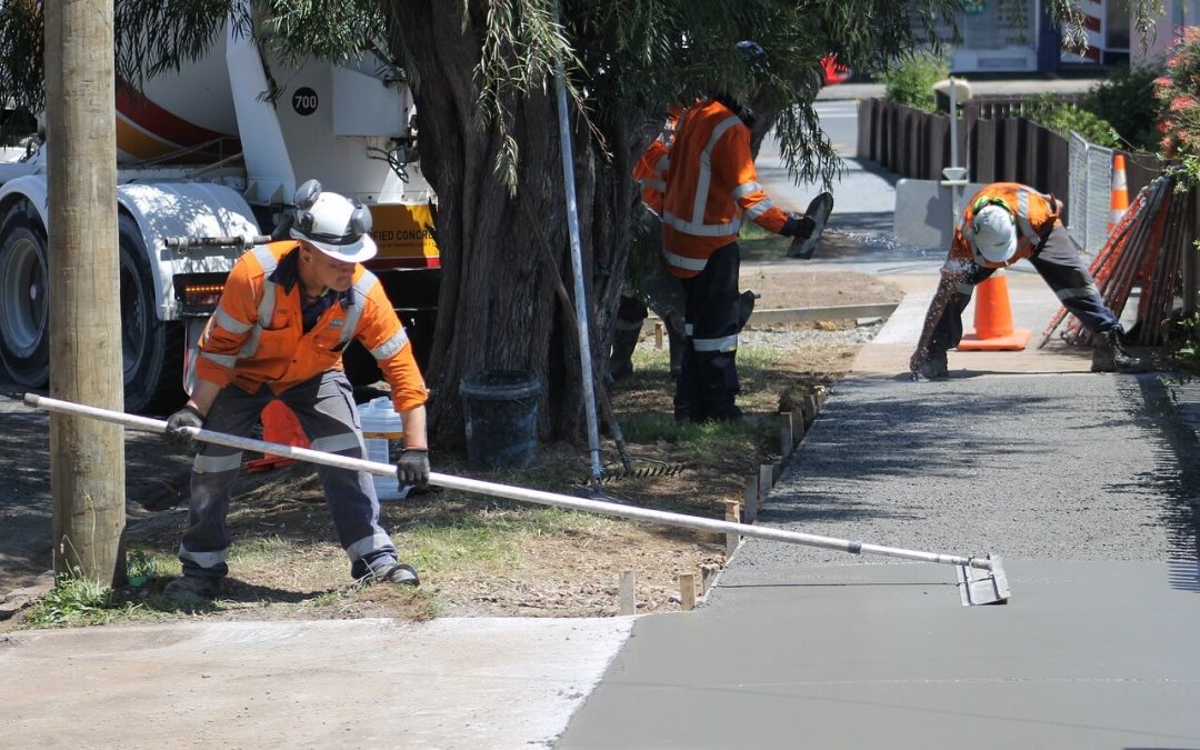 man resurfacing and polishing concrete